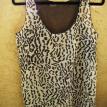 Leopard sleeveless top with see through back. Black